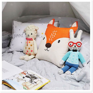 Playtime in a play teepee with fox cushion and toys