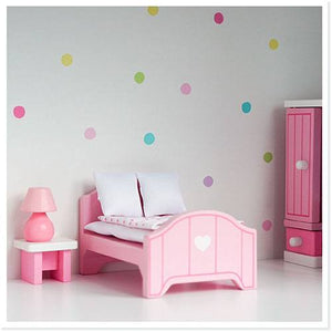 Pink dolls house furniture