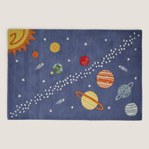 Children's rug with solar system design on a blue background
