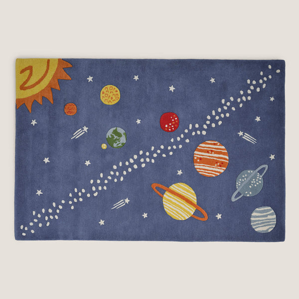 Children's rug with solar system design on a blue background