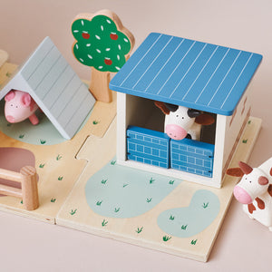 Wooden toy cows