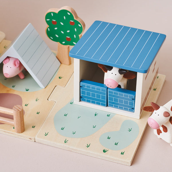 Wooden toy cows