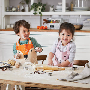 Child's apron in miss bunny and mr fox.	