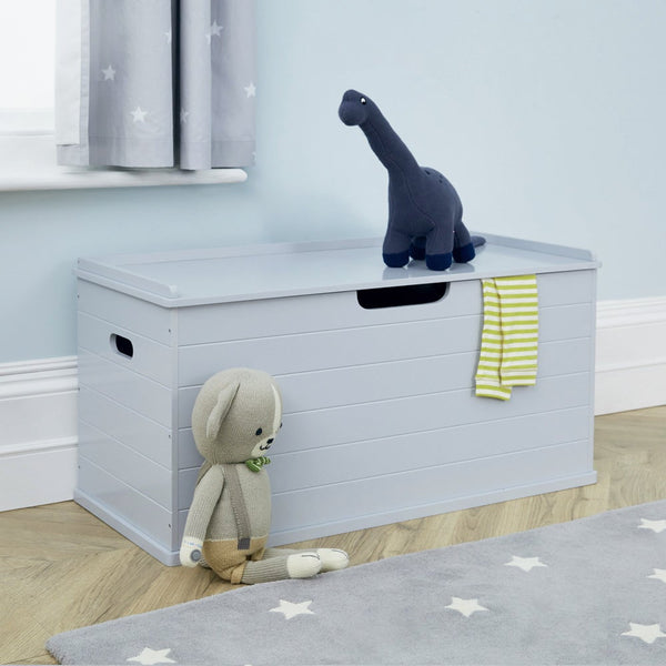 Grey large classic toy box in a room with toys	