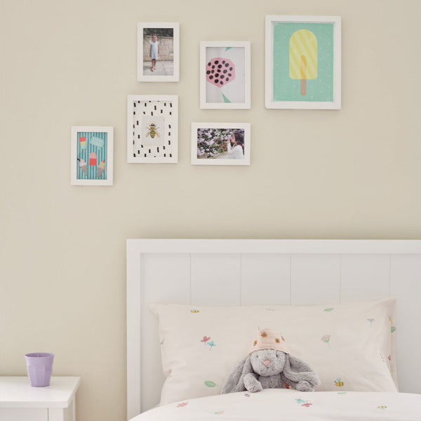 white wooden photo frame set