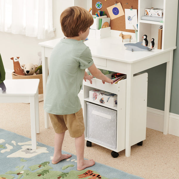 Child with under desk storage tower