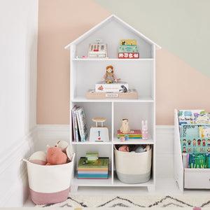 wooden bookcase with toys and books	