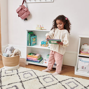 Crompton low bookcase with little girl reading	