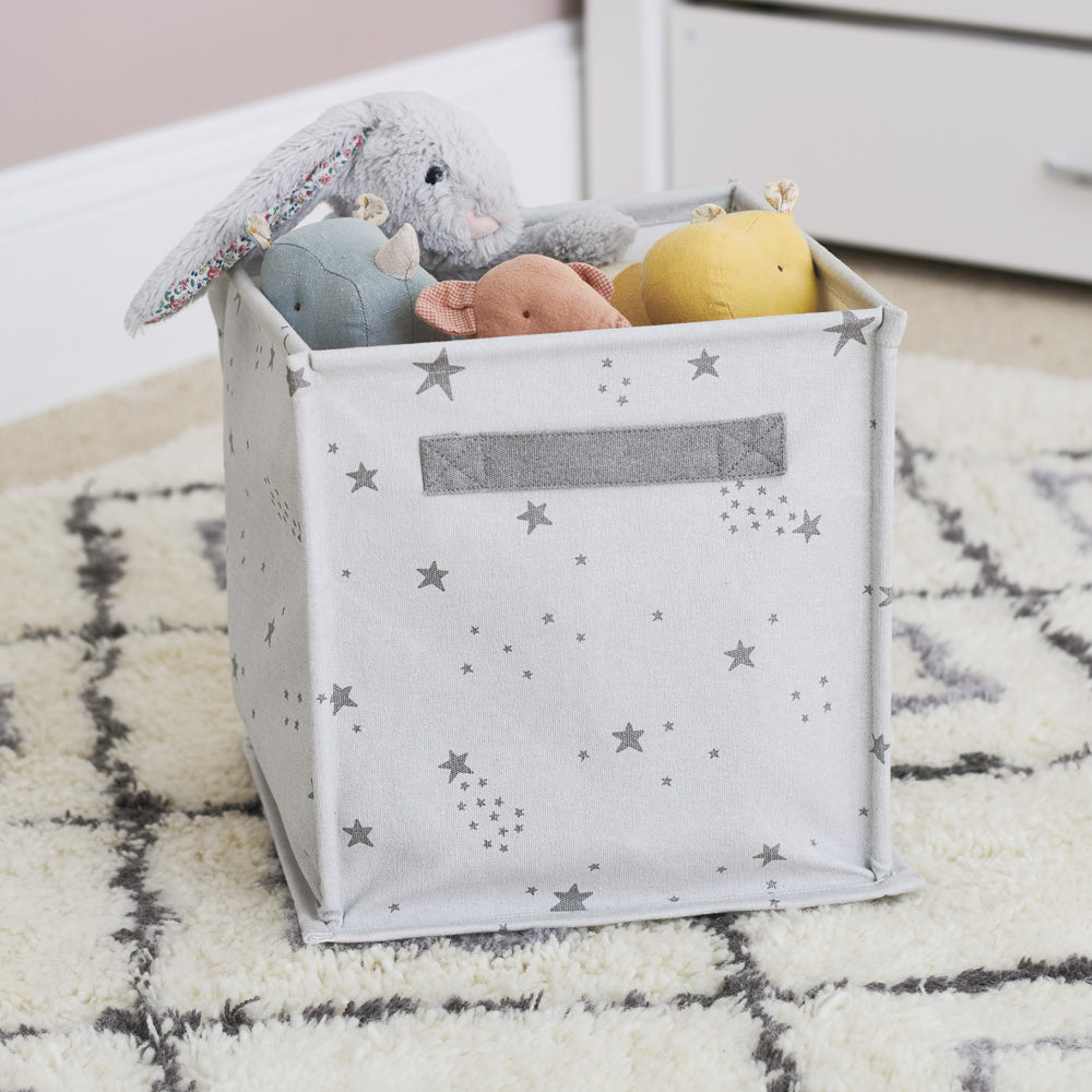 Grey stars designed canvas storage cube with toys inside