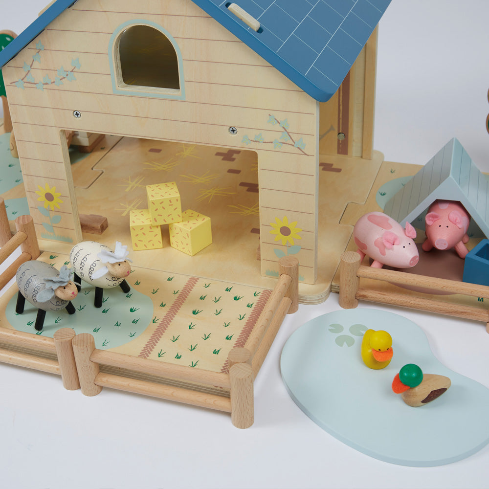 Wooden sheep, pigs and ducks